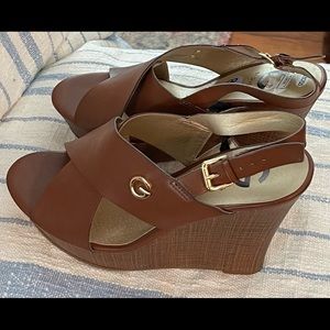 Brown Wedges by Guess. Size 8 1/2. Never worn.